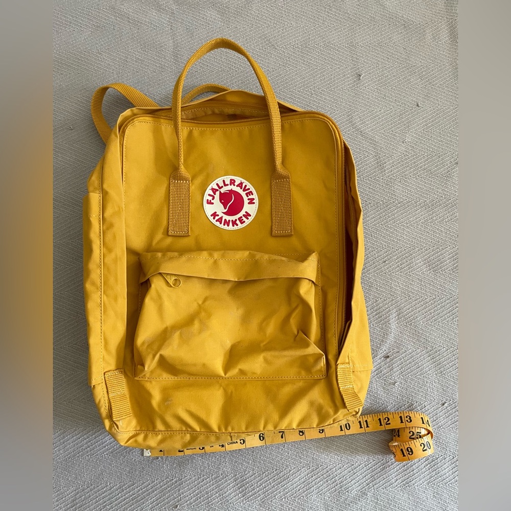Fjallraven backpack. Mustard Yellow. Never been used.